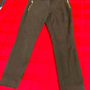 BeBe dress slacks skinny legs gold logos